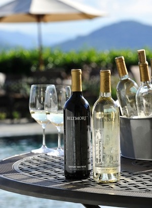 Red and white Biltmore wine on a table outside